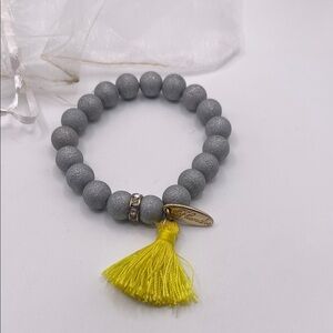 Plunder Gray Beaded Bracelet with Yellow Tassel